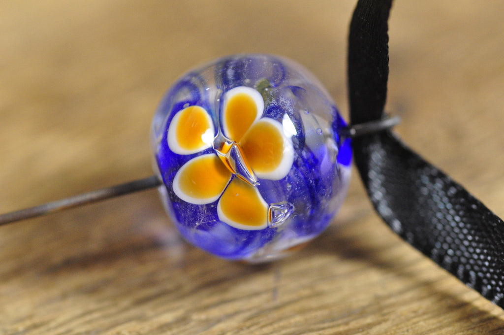 Spinner's Fetch Hook (Orifice hook) Cobalt with Amber Flowers